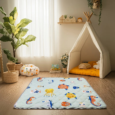 Representation de mousse tapis bebe merveille océan dans la chambre.