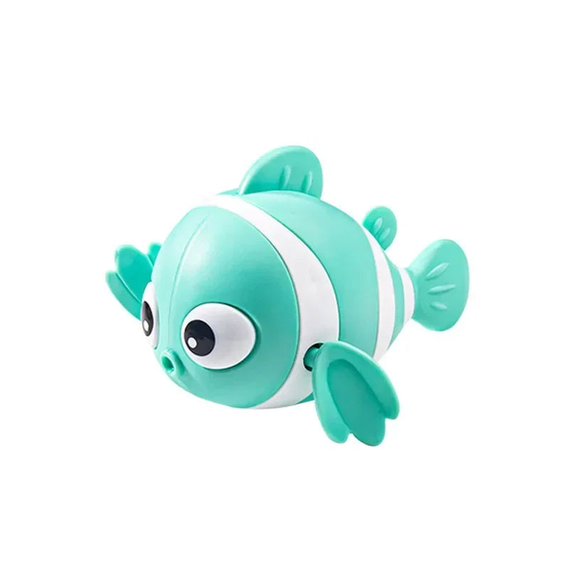 Jouet baignoire bébé  poisson nageur vert