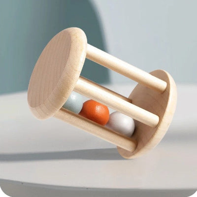 Hochet bebe avec cloche en cage en bois.