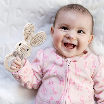 Le hochet pour bebe fait du bruit lorsque votre tout petit agite sa main.
