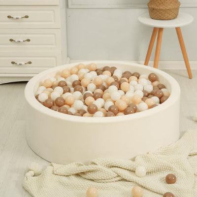 Piscine a balle pour bebe match la décoration.